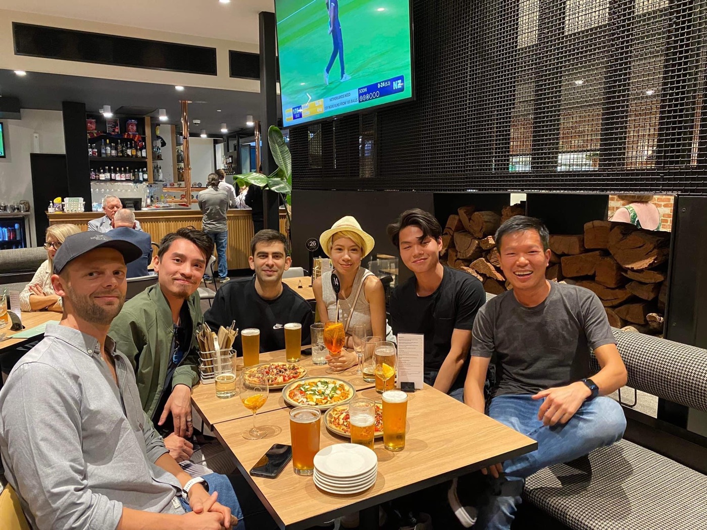 Group of friends at a bar in Adelaide for their first hangout