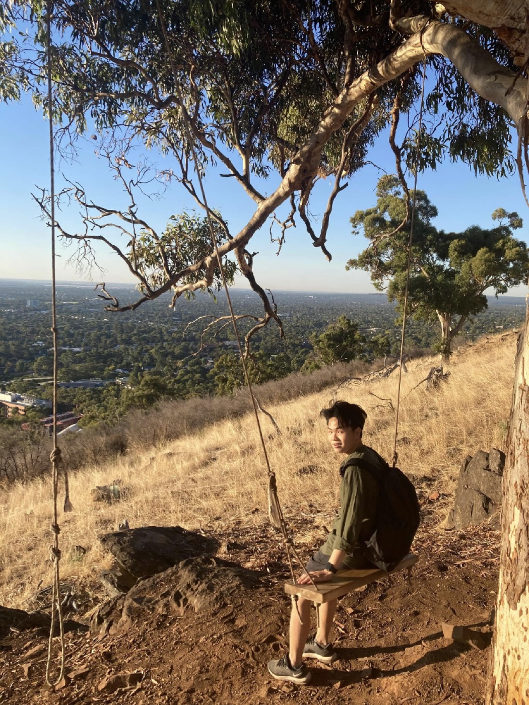 A rope swing overlooking the Adelaide Hills at Waite Reserve