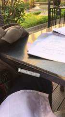 Homework on a table at Highlands Coffee