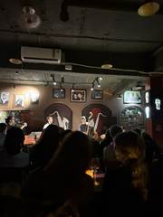 Musicians performing for an audience in a jazz club