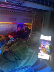 Friends resting on a sleeper bus
